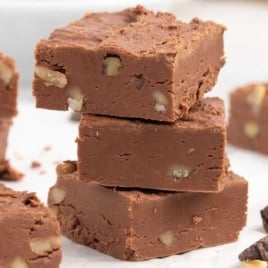 A close up shot of Fantasy Fudge Recipe stacked on top of each other