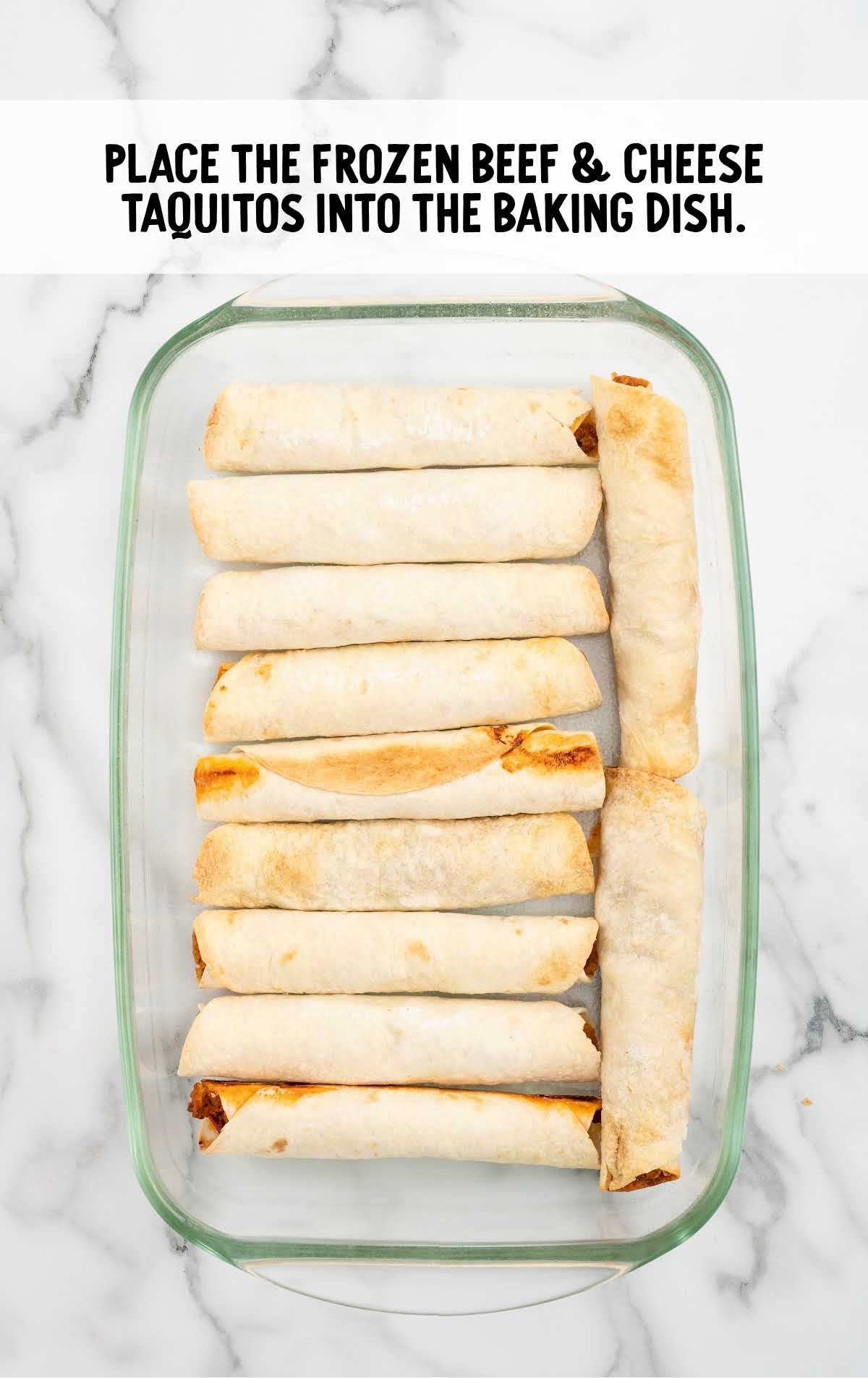 taquitos placed into a baking dish