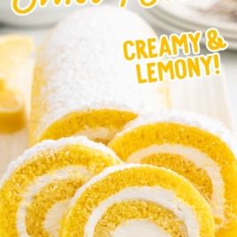 slices of Lemon Swiss Roll sprinkled with powdered sugar on a plate