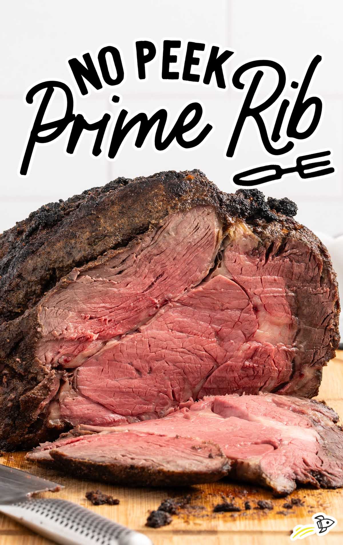 a cooked prime rib sliced on a wooden board