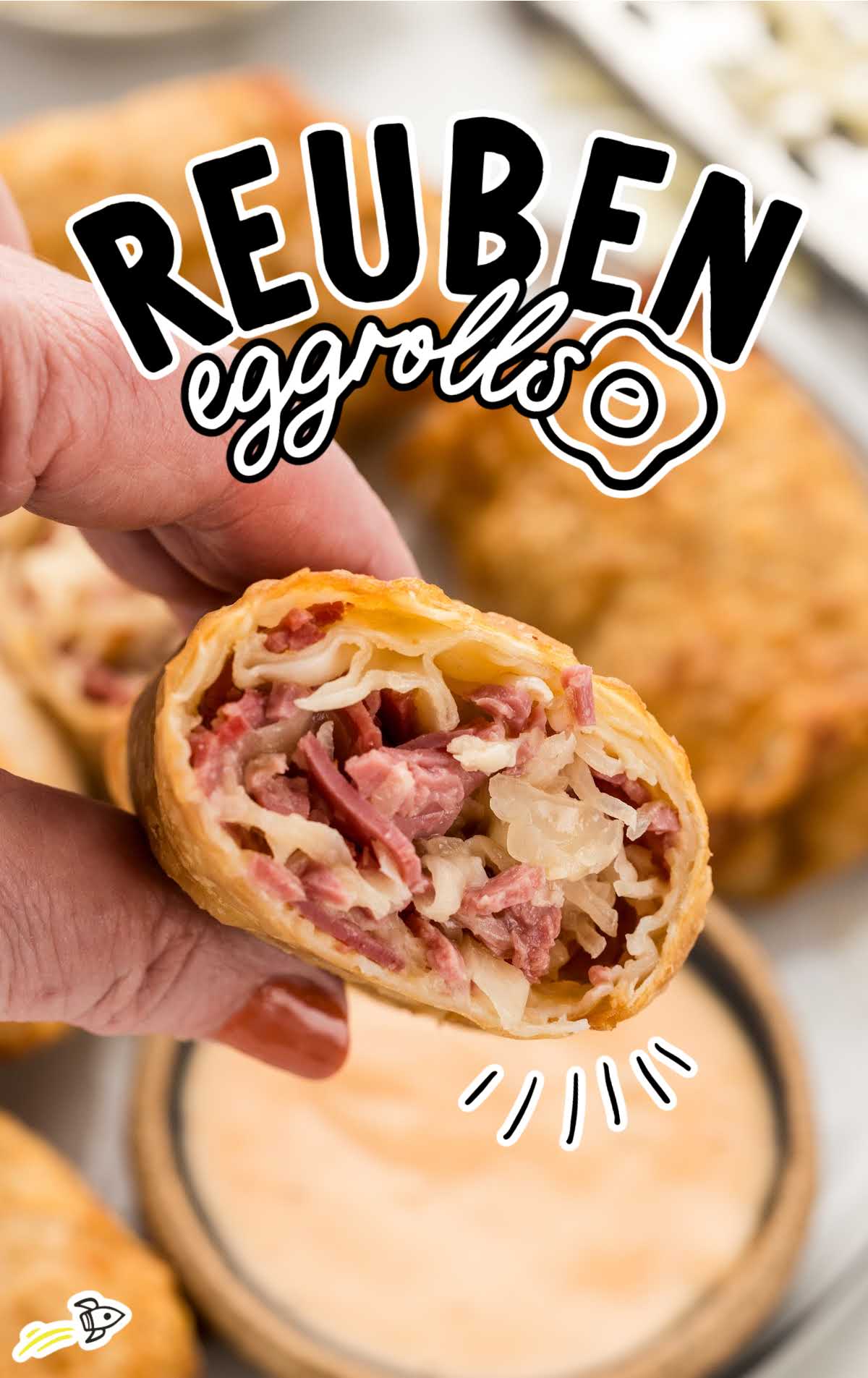a Reuben Eggroll with a bowl of thousand island dressing