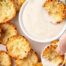 a plate of Fried Pickles with a bowl of sauce