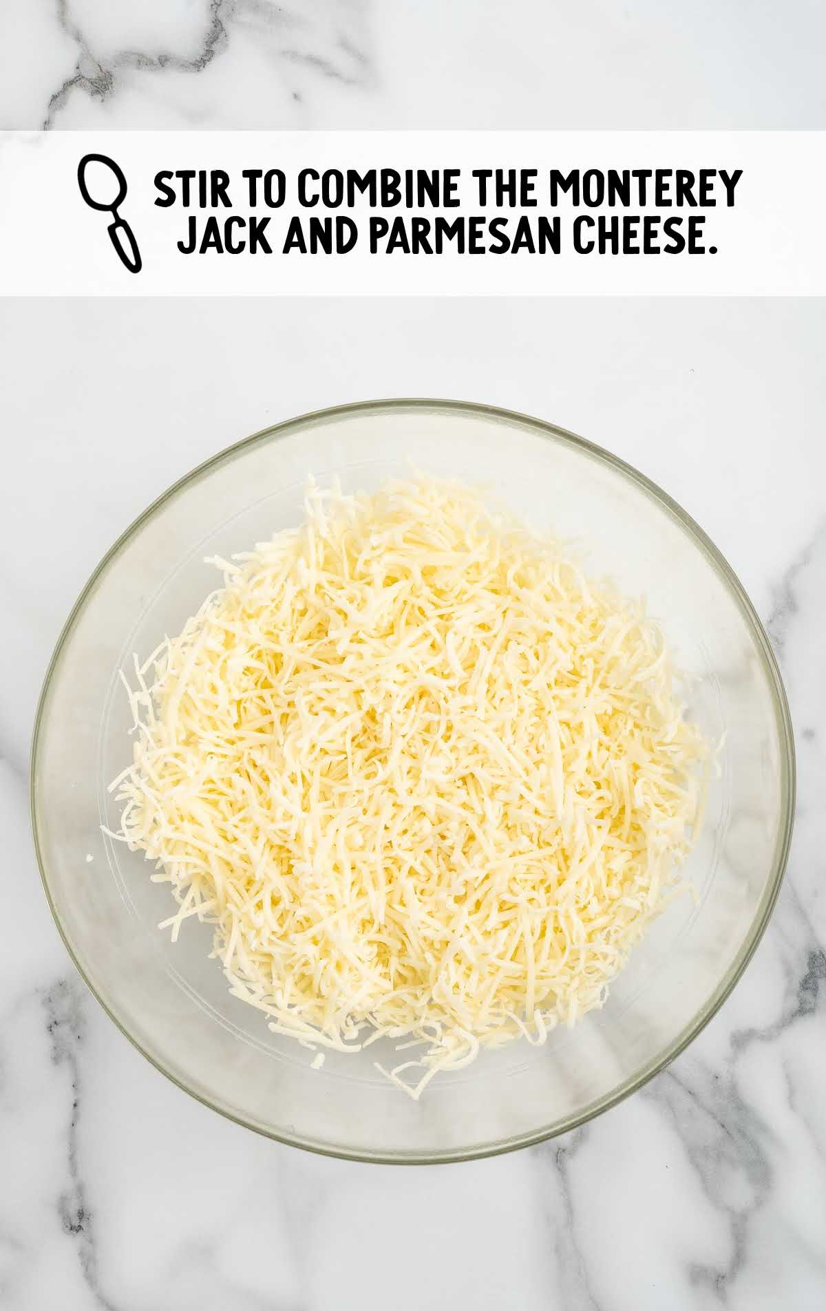 shredded Monterey Jack cheese and shredded Parmesan cheese combined in a bowl