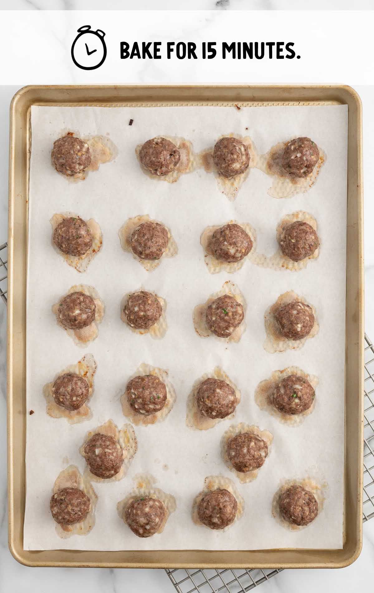 meatballs baked on a baking sheet