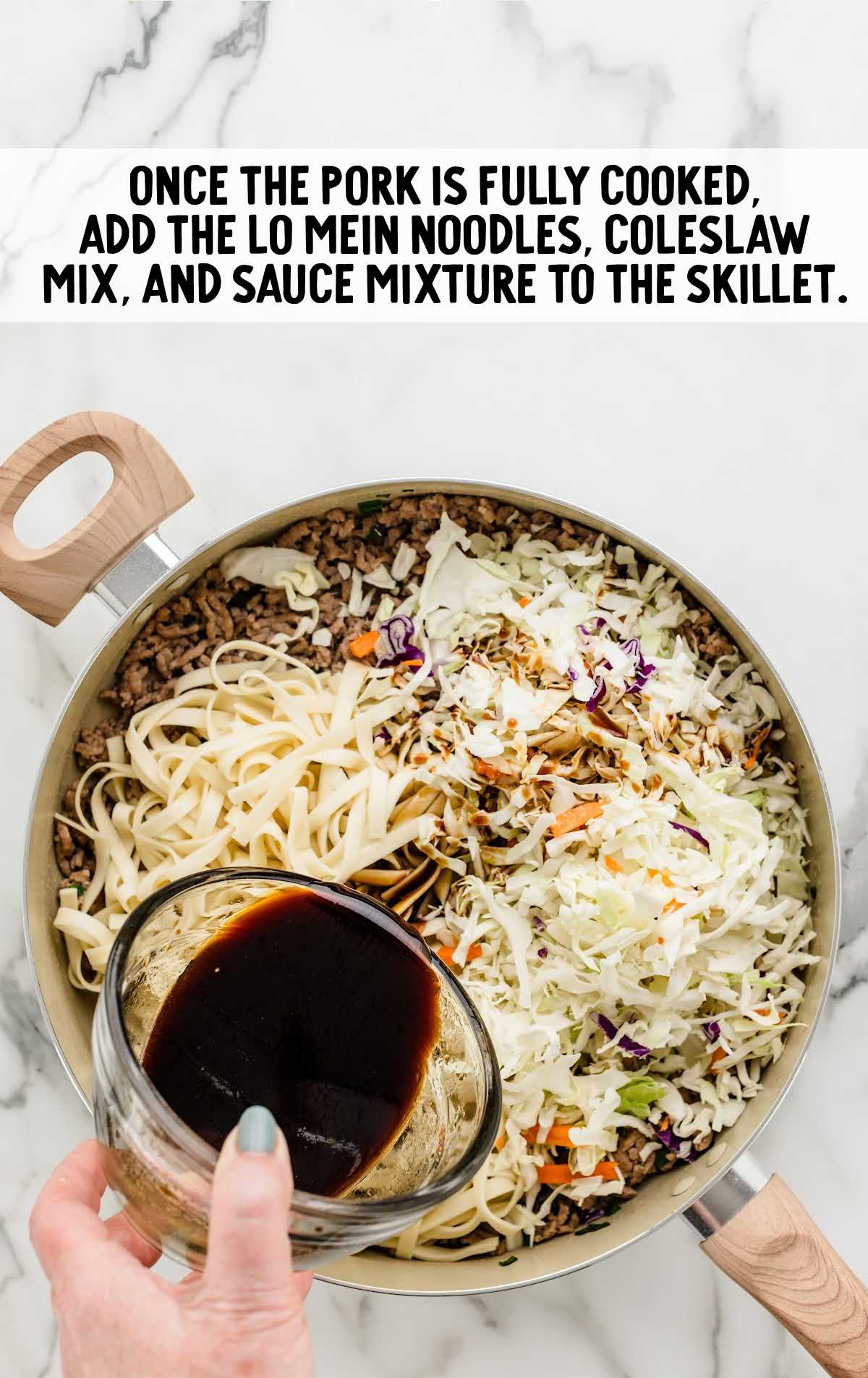 LoMein noodles, coleslaw mix, and sauce added to the skillet