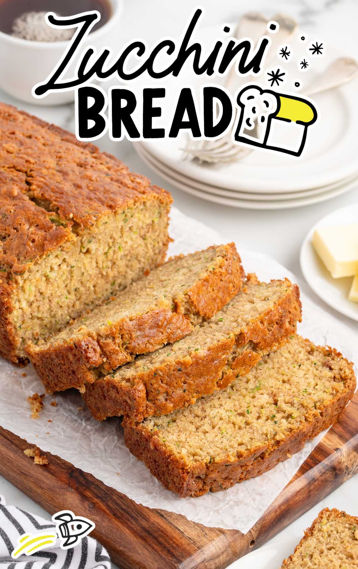 Overhead view of sliced zucchini bread showing its tender crumb and golden brown crust.