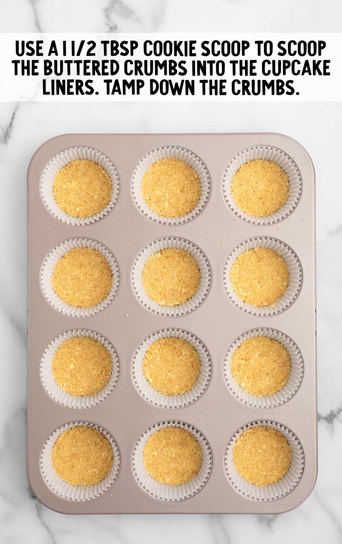 crumb mixture added to the cupcake liners