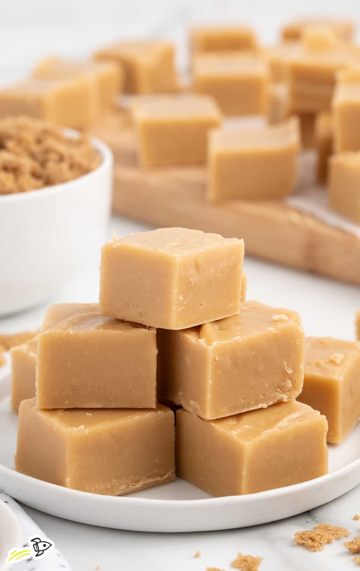 Brown Sugar Fudge stacked on top of each other on a plate