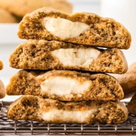 Carrot Cake Stuffed Cookies stacked on top of each other