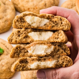 Carrot Cake Stuffed Cookies stacked on top of each other