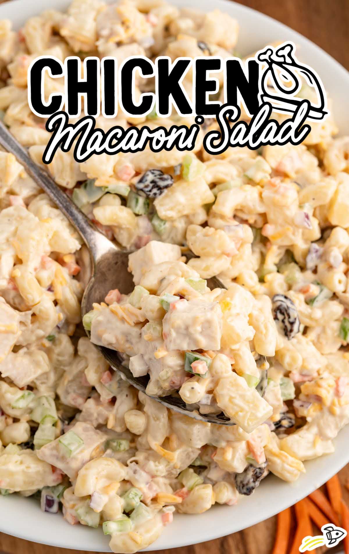 a plate of Chicken Macaroni Salad with a spoon