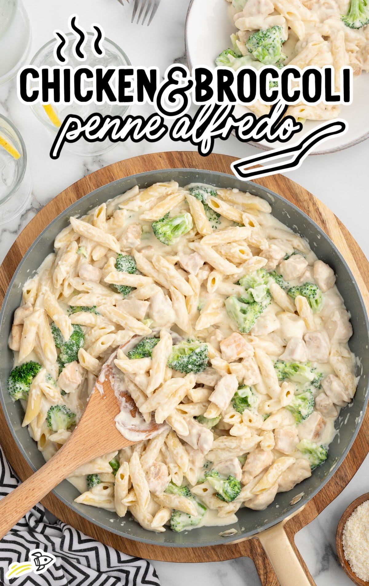 a skillet of Chicken and Broccoli Penne Alfredo