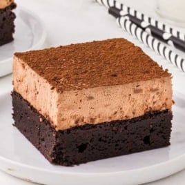 a slice of Chocolate Mousse Brownie on a plate