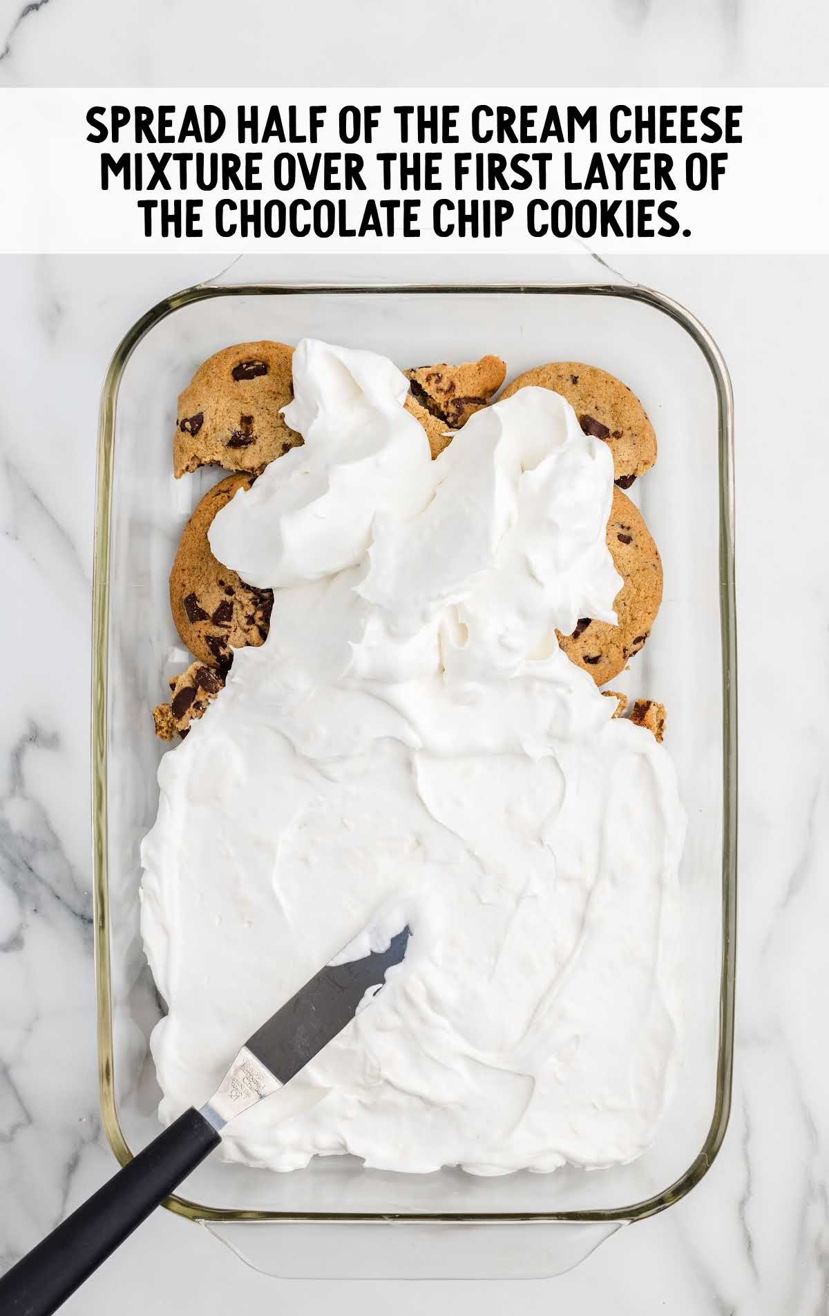 cream cheese mixture spread over the layer of cookies