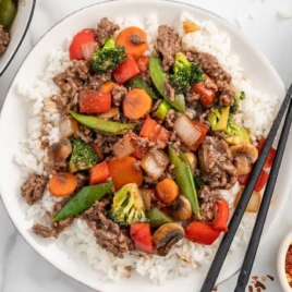 a plate of Ground Beef Stir Fry served over white rice