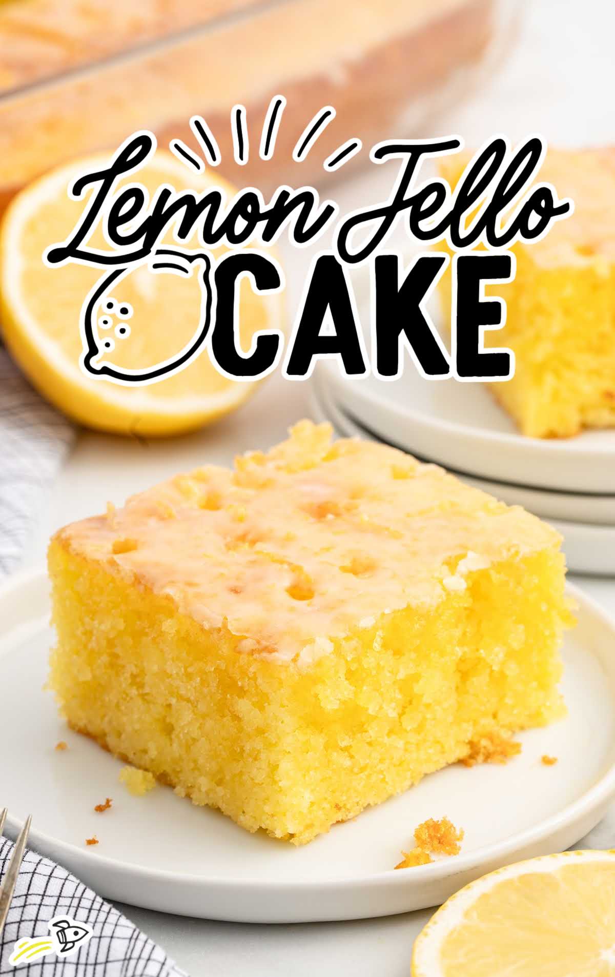 a slice of Lemon Jello Cake on a plate