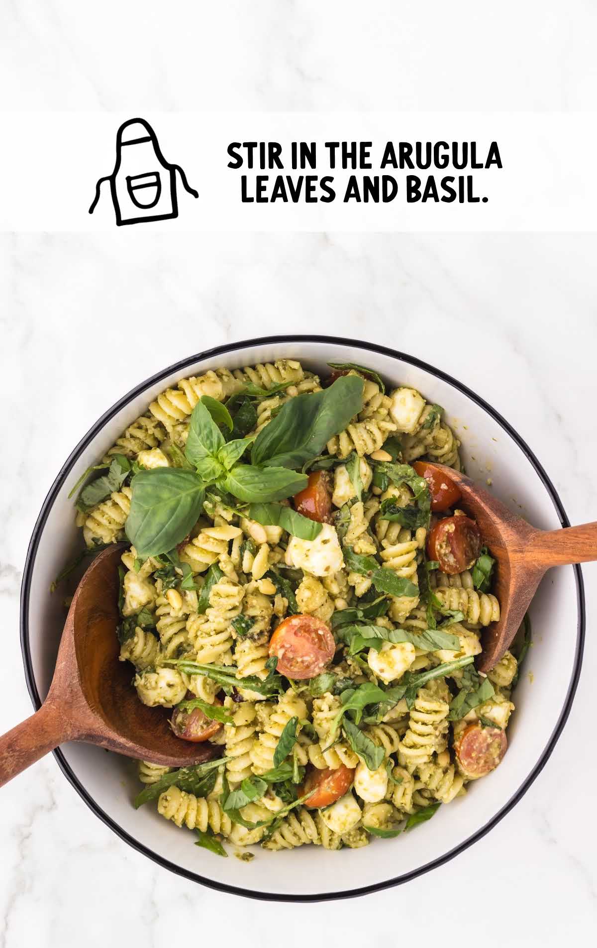 fresh arugula leaves and torn fresh basil added to the pasta salad