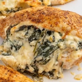 a plate of Spinach Stuffed Chicken Breast