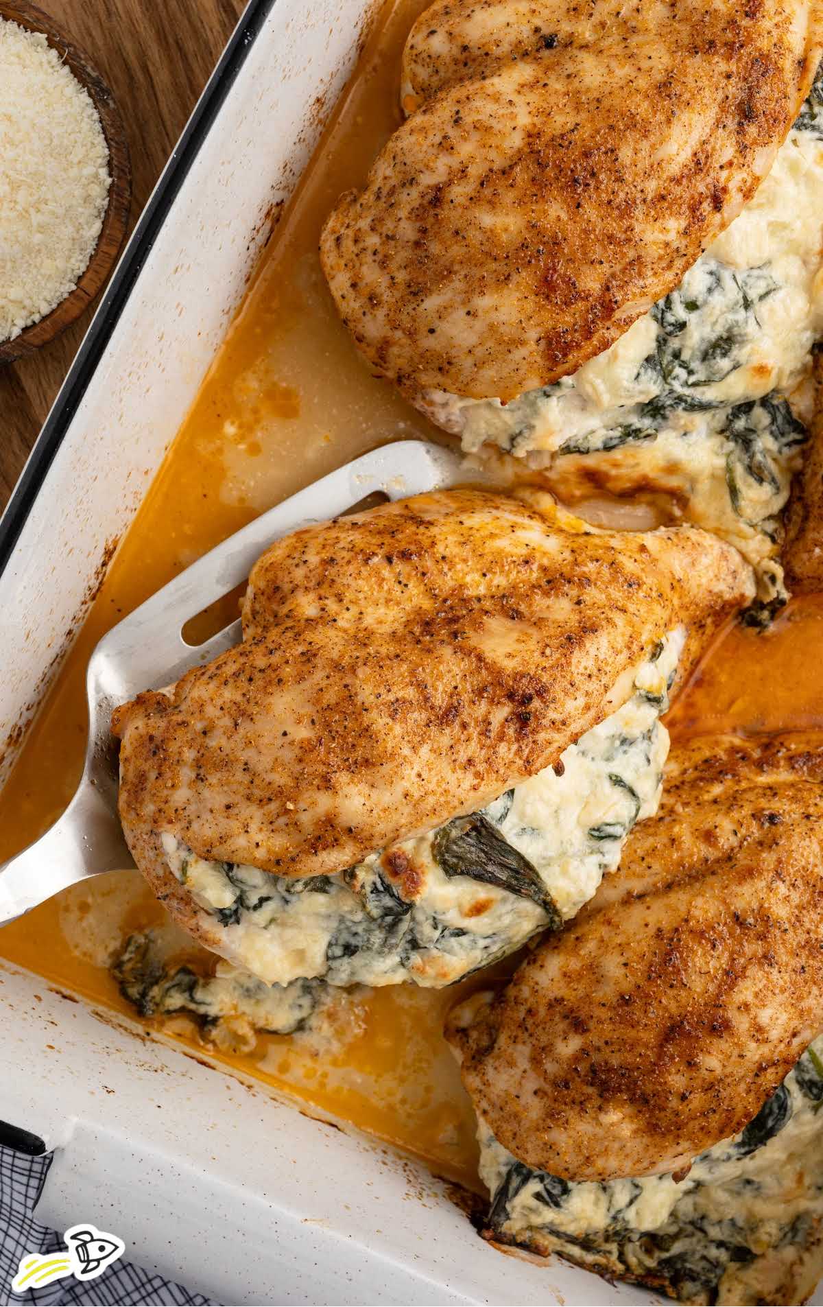 a baking dish of Spinach Stuffed Chicken Breast