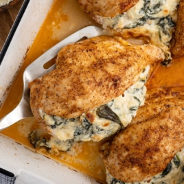 a baking dish of Spinach Stuffed Chicken Breast