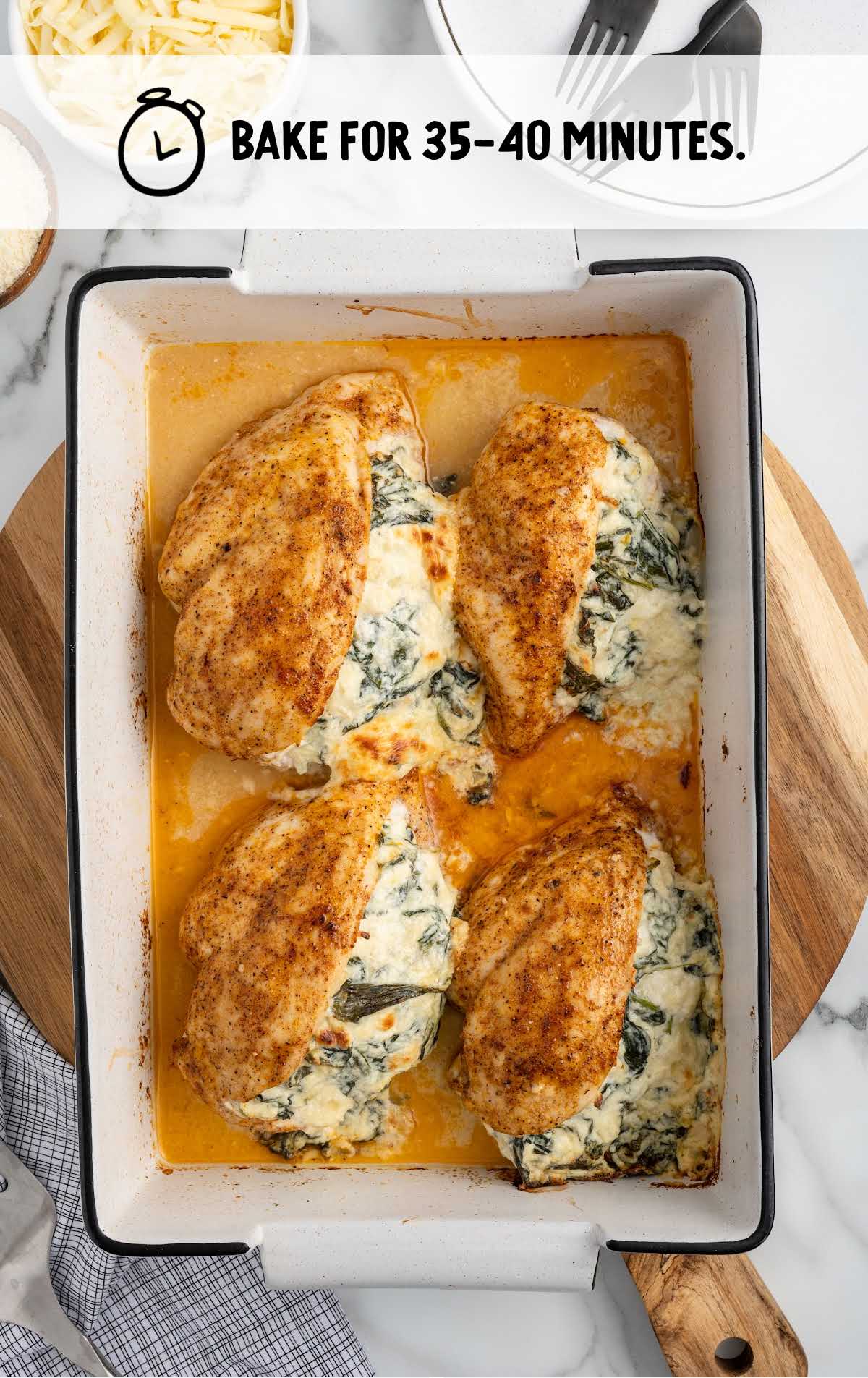 Spinach Stuffed Chicken Breast baked in a baking dish