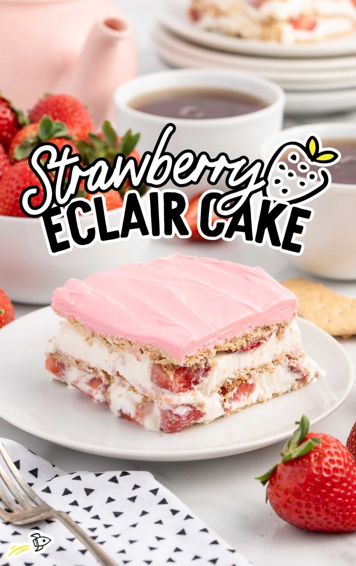 a slice of Strawberry Eclair Cake on a plate