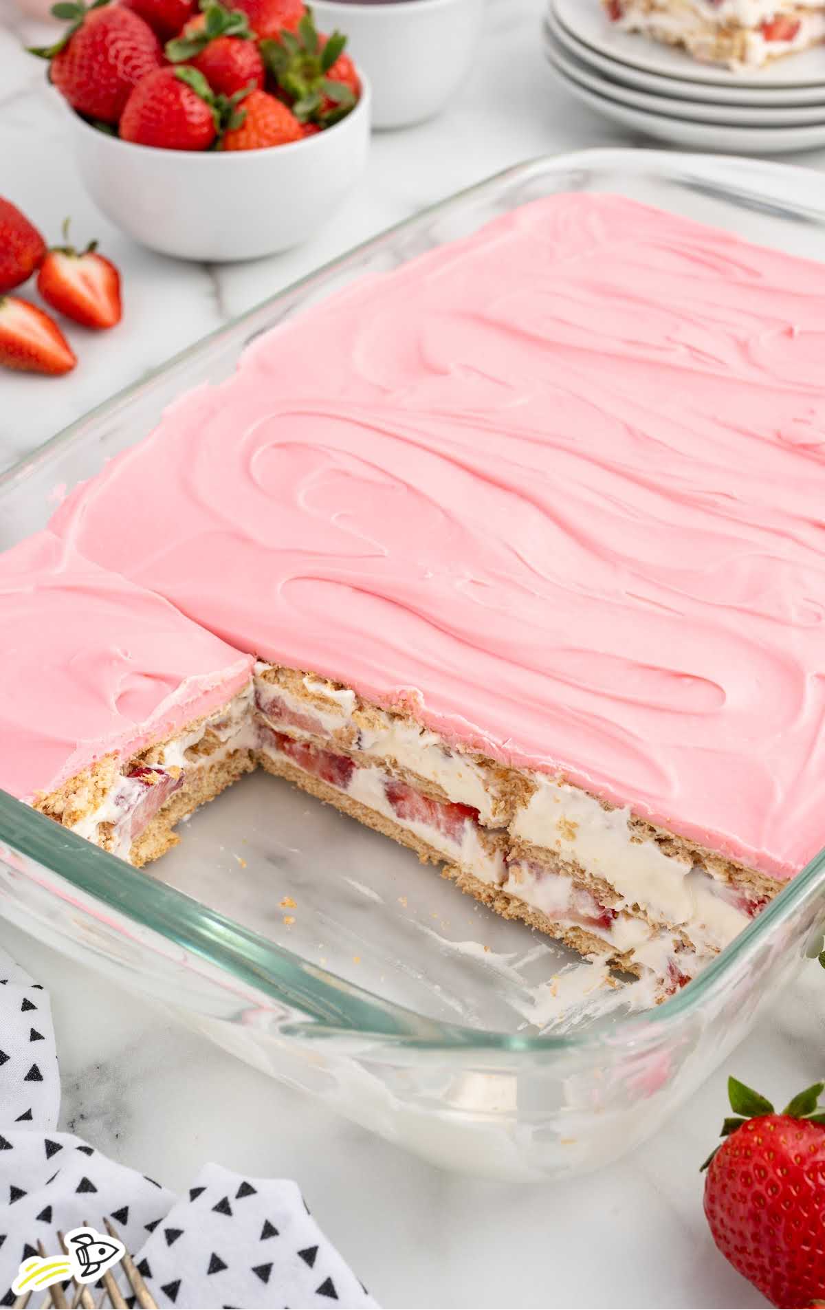 a baking dish of Strawberry Eclair Cake