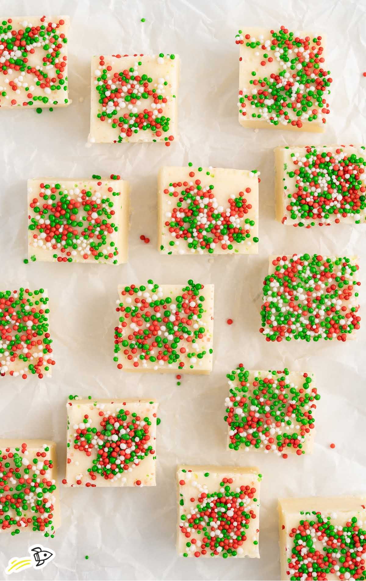 Sugar Cookie Fudge topped with christmas sprinkles