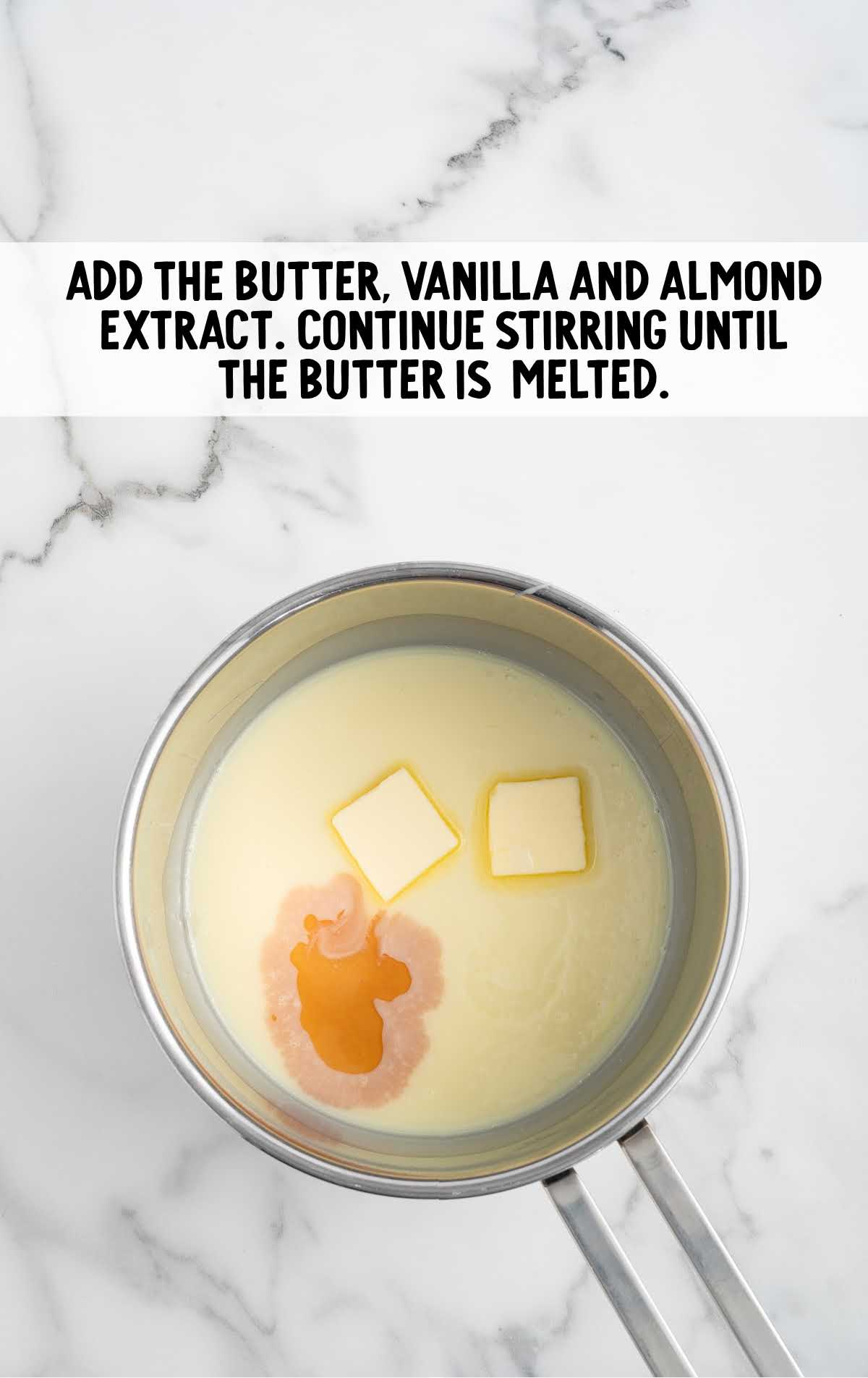 softened butter, pure vanilla extract, and almond extract stirred into the pan