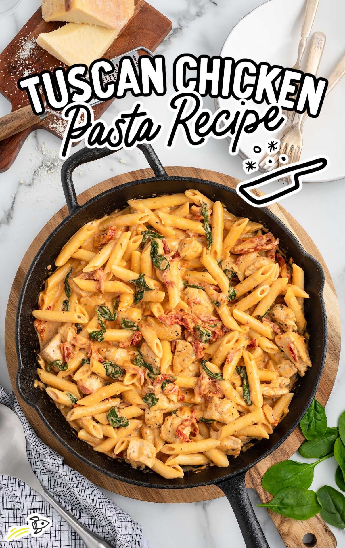 a skillet of Tuscan Chicken Pasta