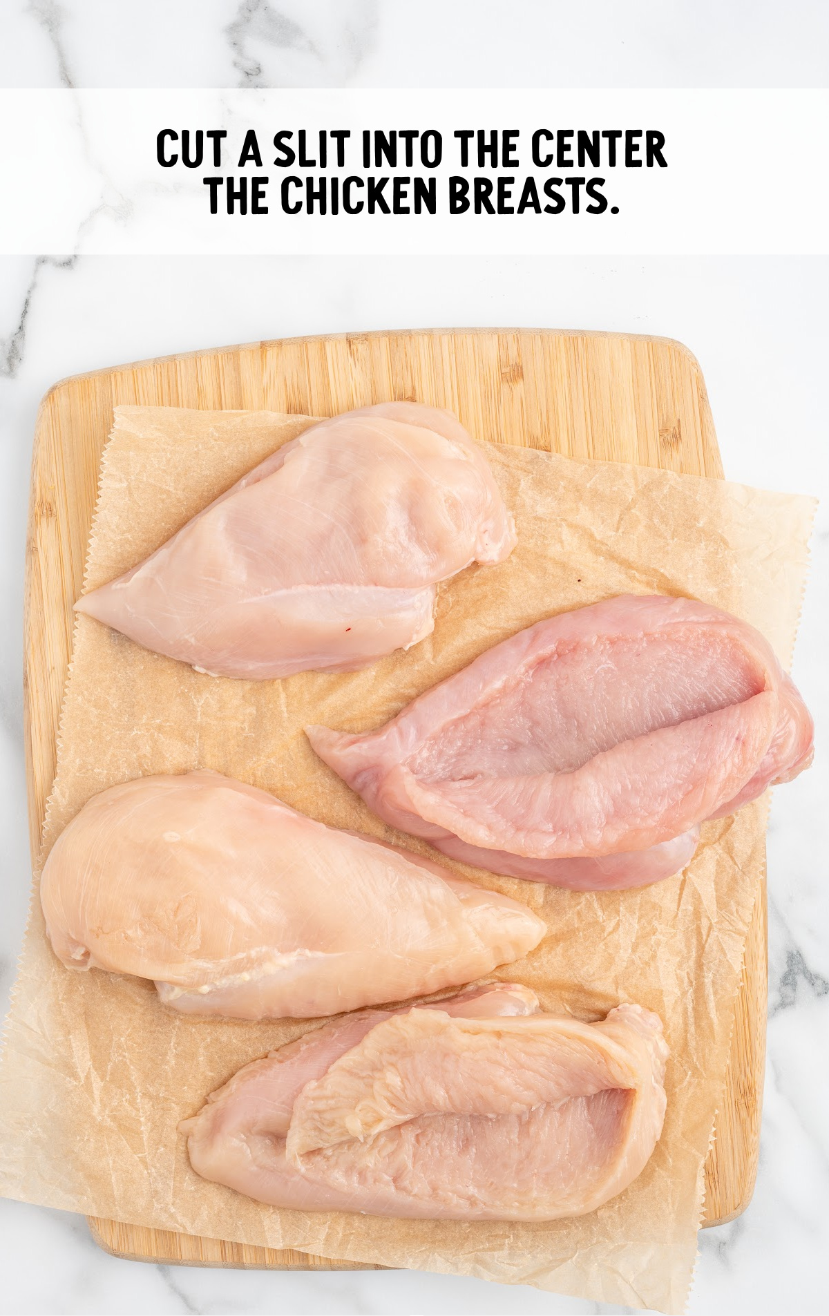 Sliced open chicken breasts.