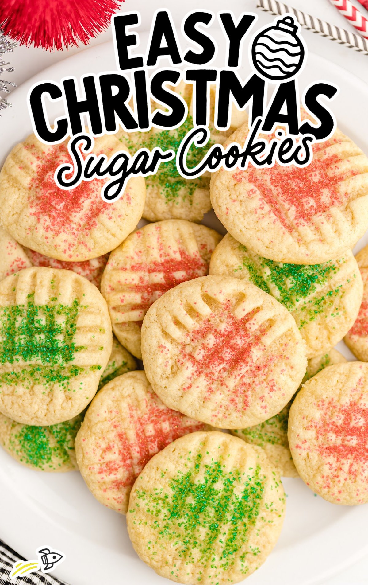 A plate of red and green decorated easy christmas sugar cookies.