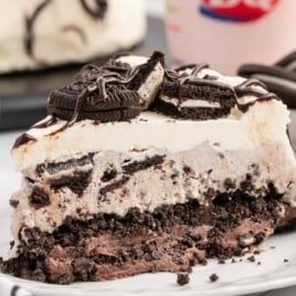 a slice of Dairy Queen Copycat Oreo Cookie Ice Cream Cake on a plate