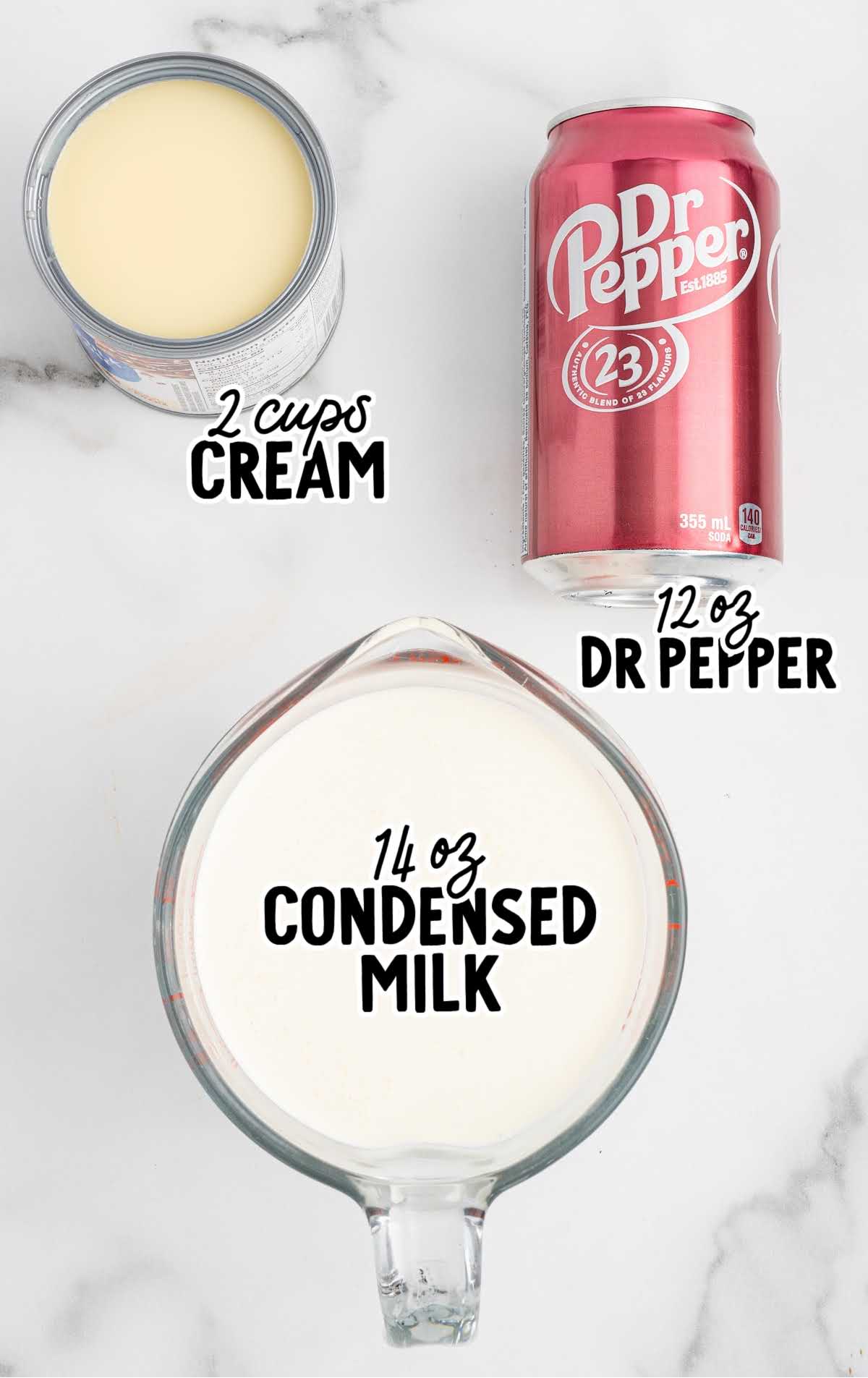 Top-down view of ingredients for Dr Pepper ice cream: heavy cream, Dr Pepper soda, and sweetened condensed milk labeled with text