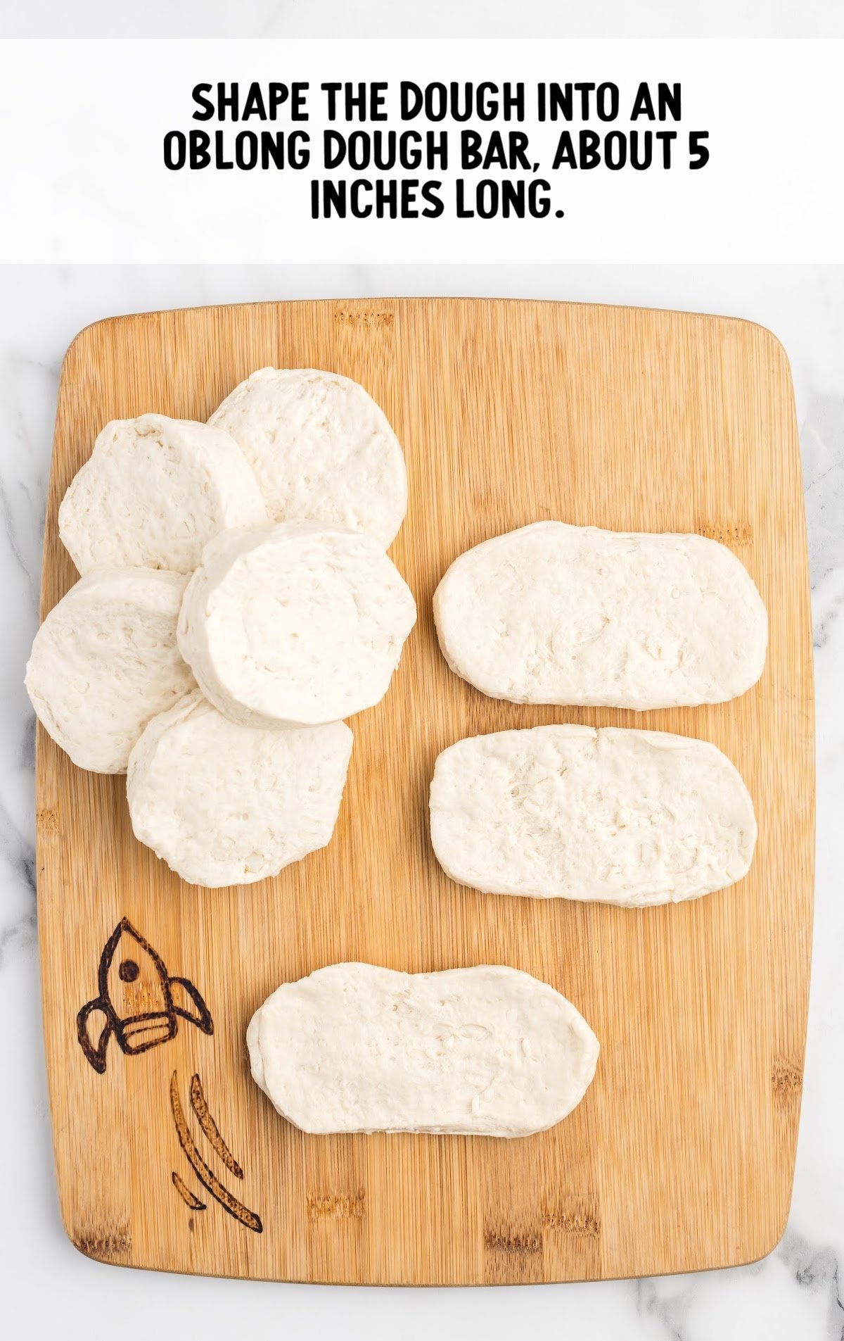 rolled out pieces of biscuit dough into oblong pieces.