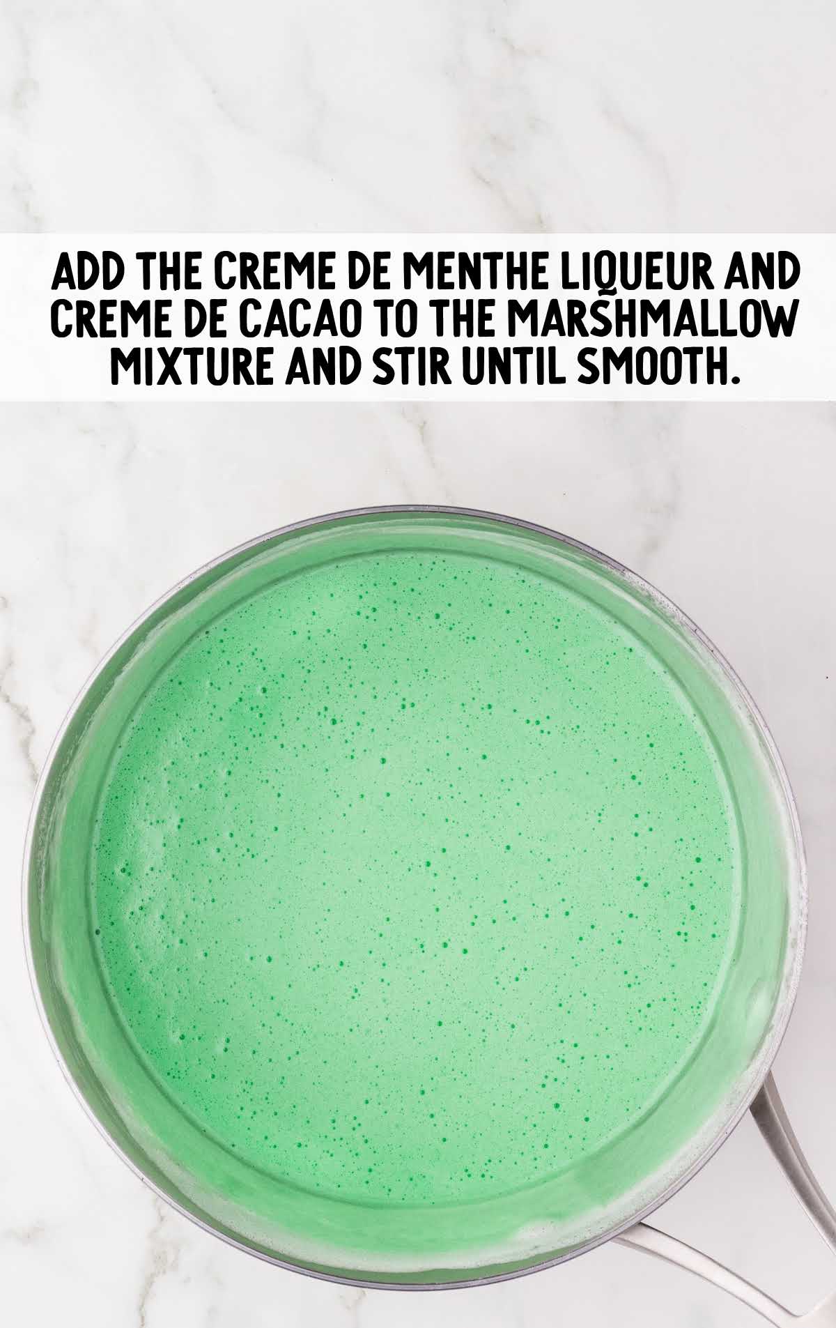 green creme de menthe liqueur and clear creme de cacao added to the marshmallow mixture