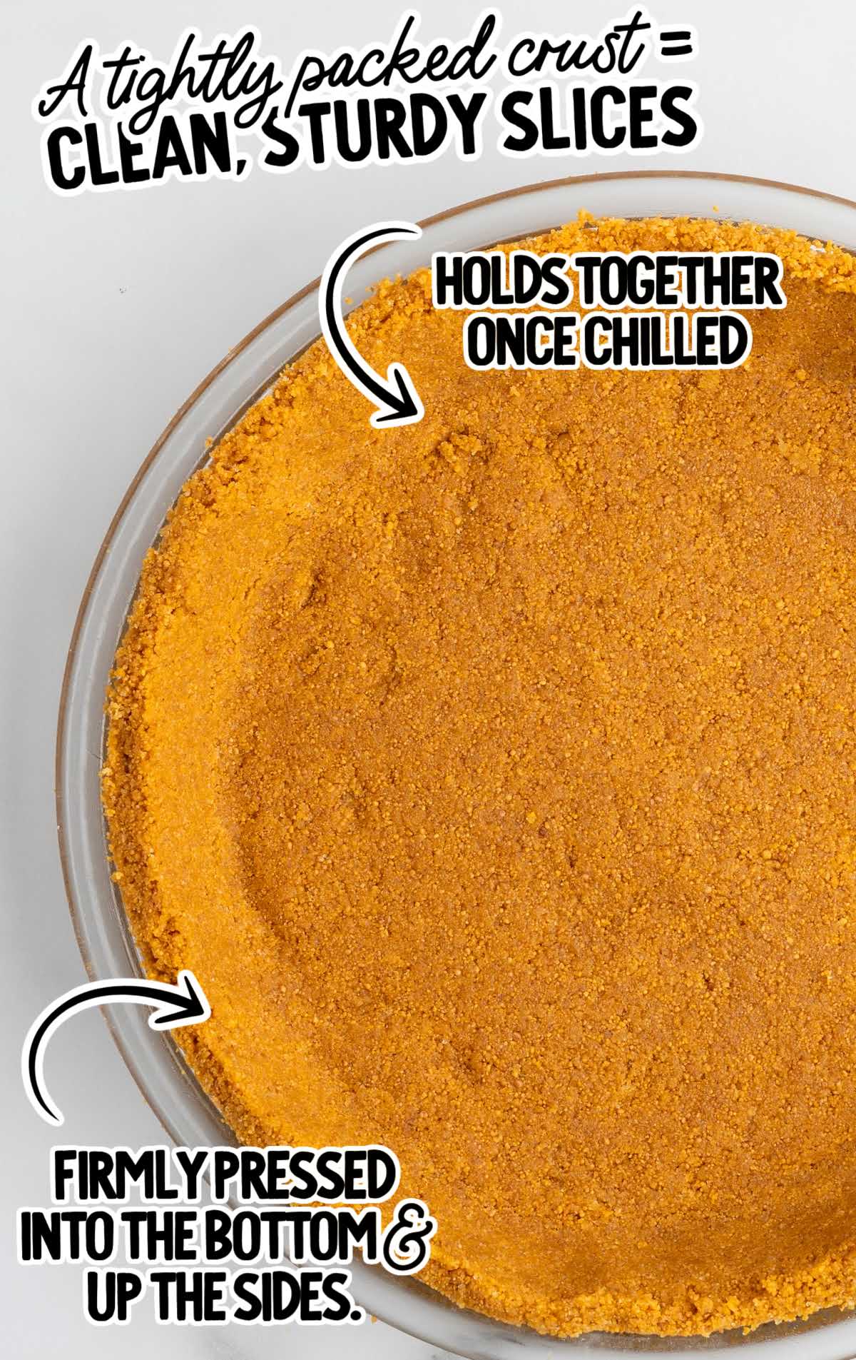 Graham cracker crust firmly pressed into a pie dish for no bake cheesecake