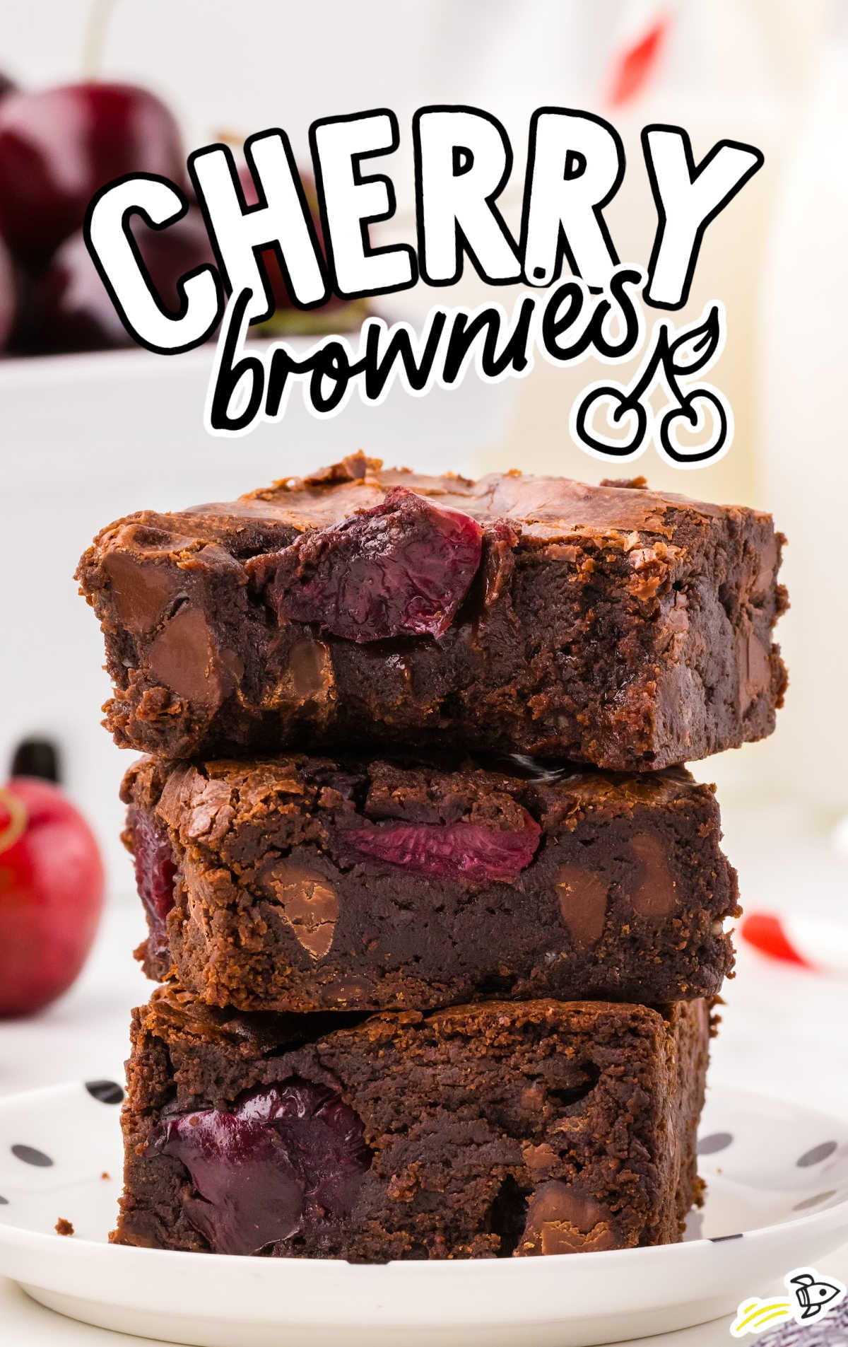 slices of cherry brownies stacked on top of each other