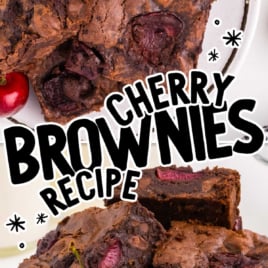 slices of cherry brownies stacked on top of each other on a plate