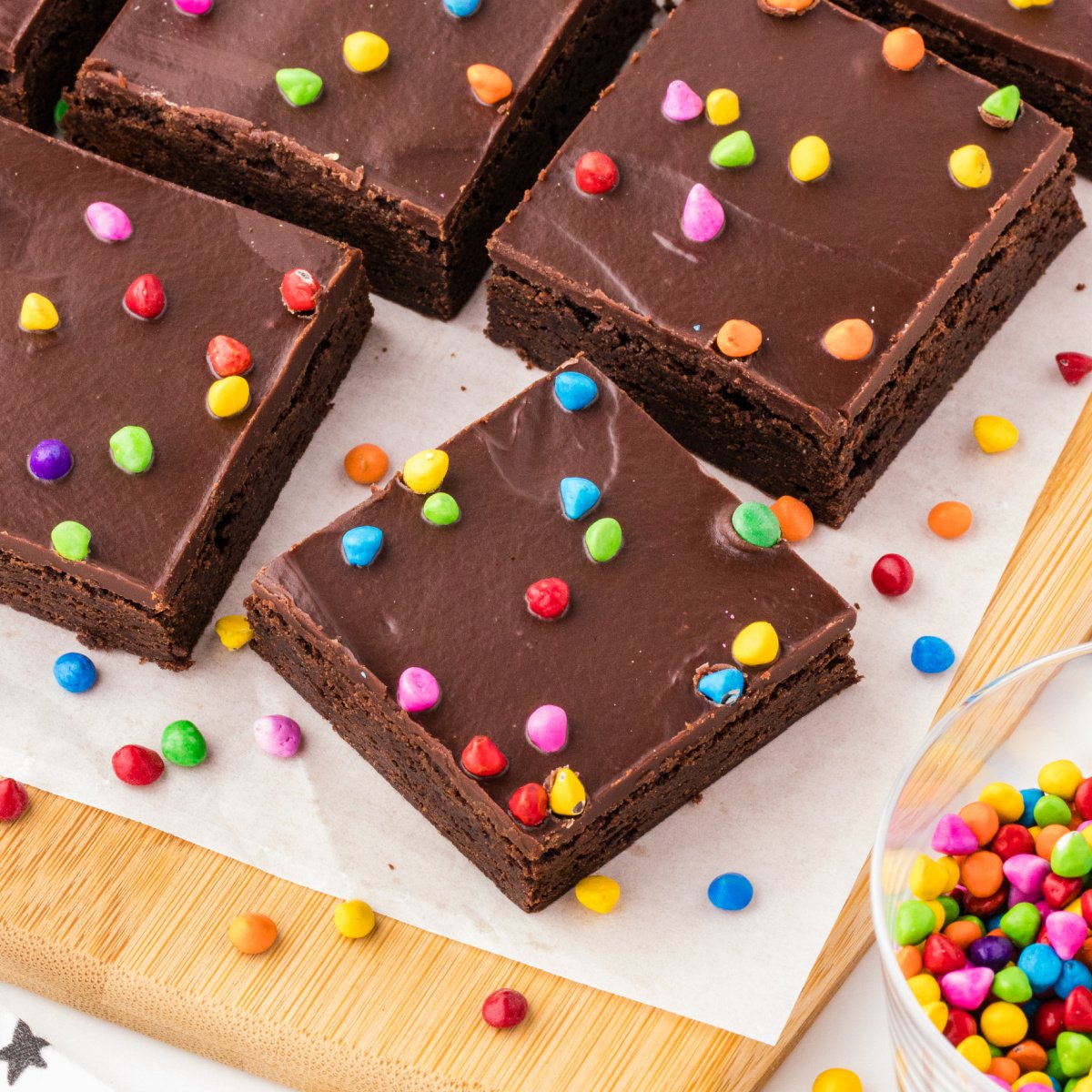 a bunch of Cosmic Brownies on a wooden board