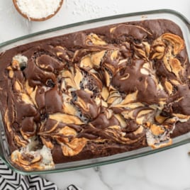 An overhead image of a glass baking dish and an Earthquake Cake.