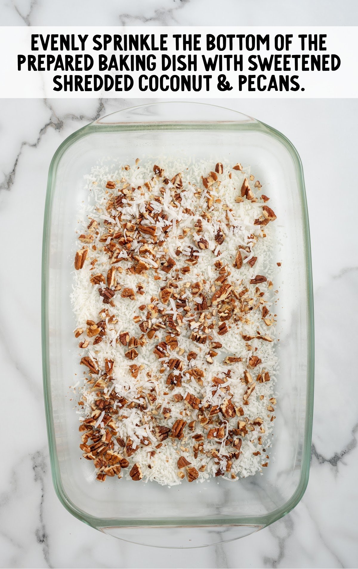 sweetened shredded coconut and pecans sprinkled at the bottom of the baking dish