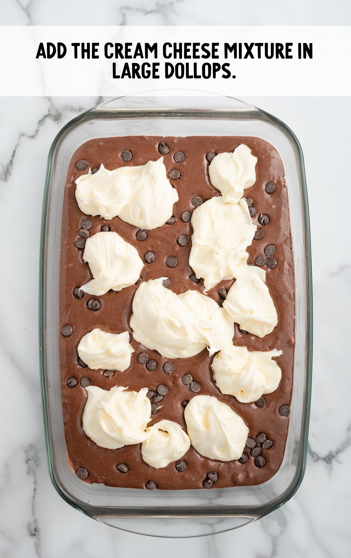 cream cheese mixture placed on top of the cake