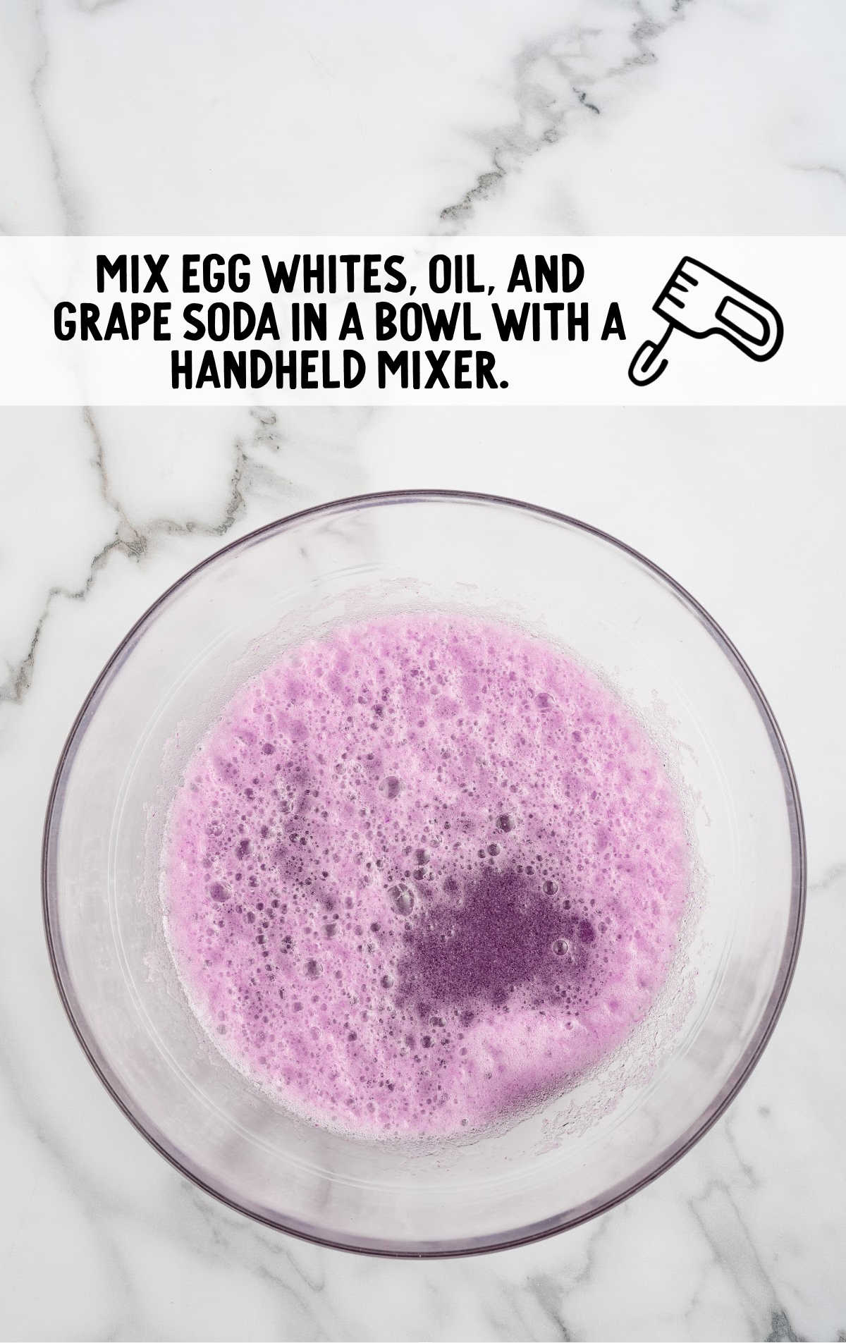 egg whites, vegetable oil, and grape soda combined in a bowl