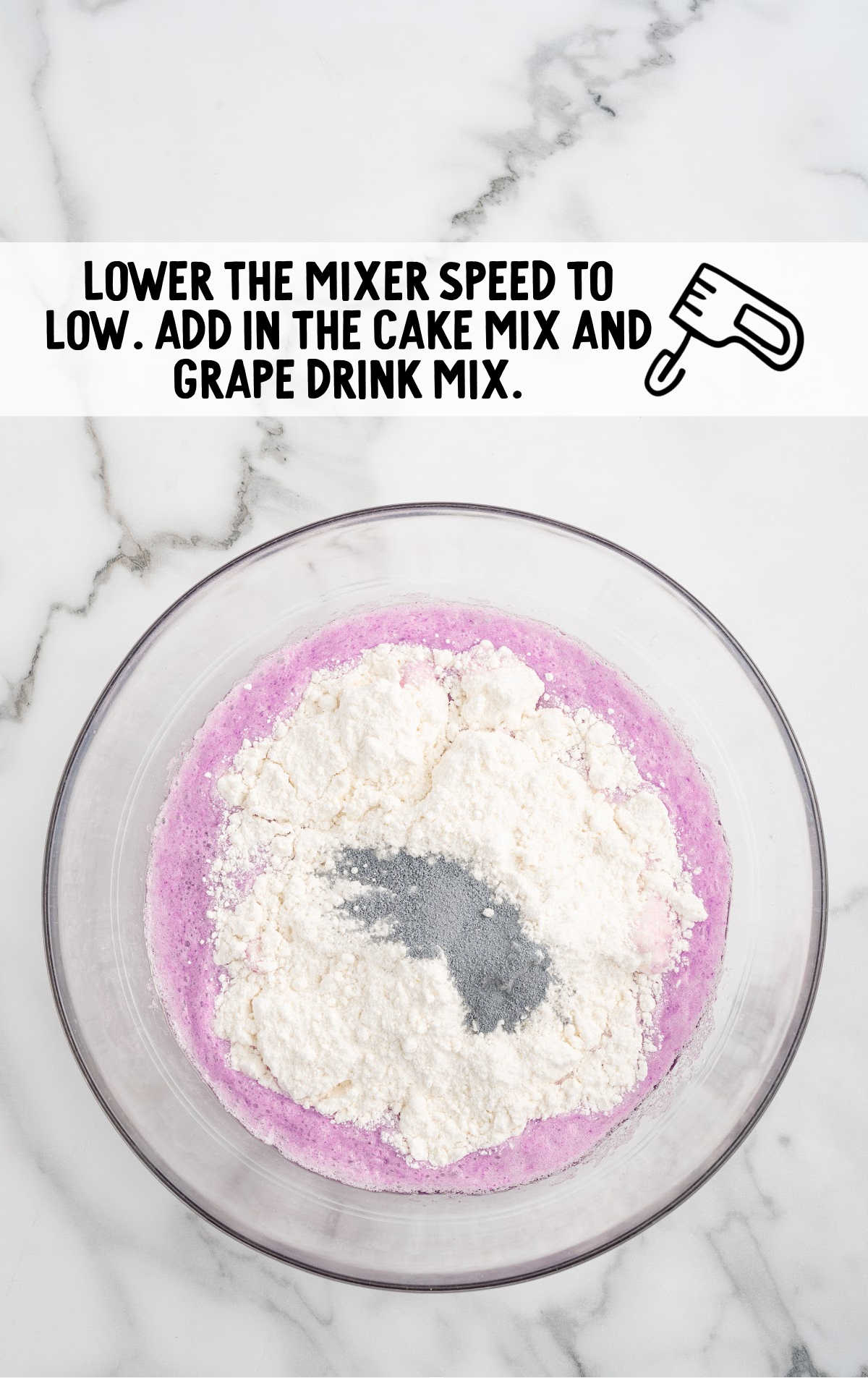 cake mix and grape drink mix combined in a bowl