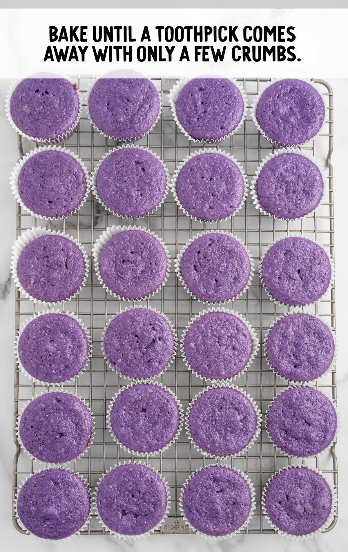 cupcakes baked and placed on a cooling rack