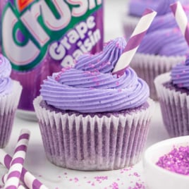 close up shot of frosted Grape Soda Cupcakes