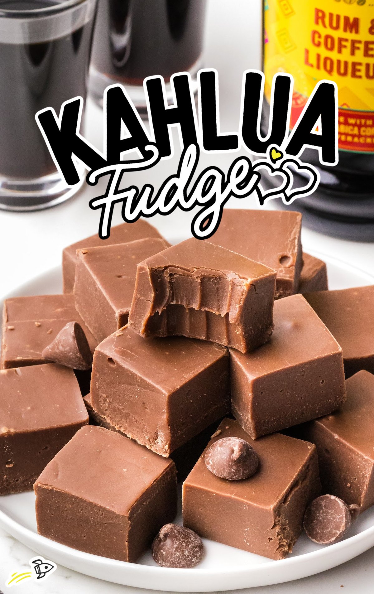 A stack of Kahlua Fudge on a white serving plate.