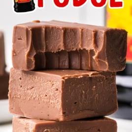 A stack of kahlua fudge. The top piece has a bite out of it.