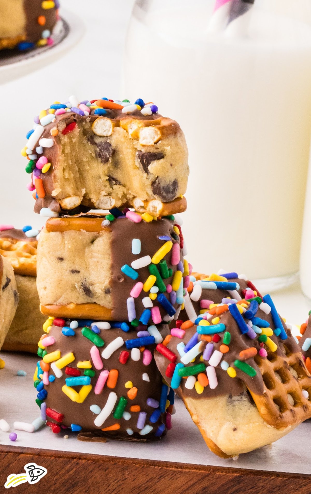 a bunch of Cookie Dough Pretzel Bites stacked on top of each other